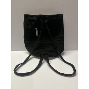 The Sak Black Crochet Drawstring Backpack Purse Silver Hardware Logo Charm